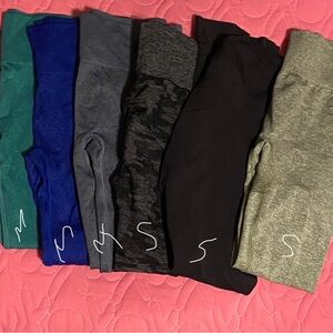Gymshark lot of randomness. Tops. Color Leggings. Random Tops. Random Leggings.
